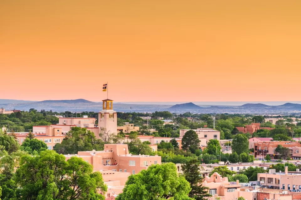 Aerial view of historic core of Santa Fe, New Mexico at dusk.